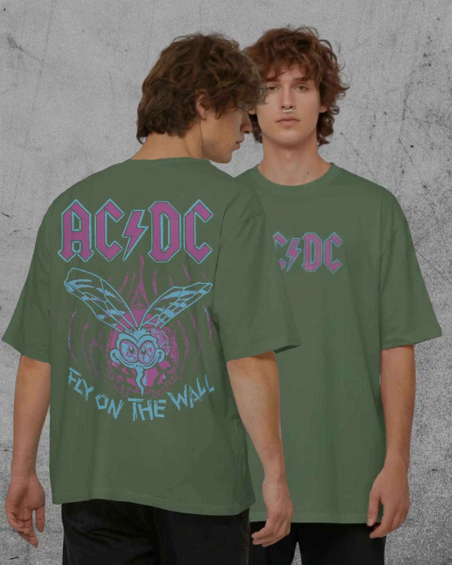 Green plus size oversized t-shirt with AC/DC Fly on the Wall graphic design, front and back, modeled by two individuals