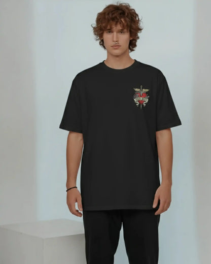 Black plus size oversized t-shirt with colorful Bon Jovi graphic design on chest, modeled on a white background