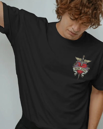 Black plus size oversized t-shirt with Bon Jovi graphic logo on chest, modeled in a relaxed pose