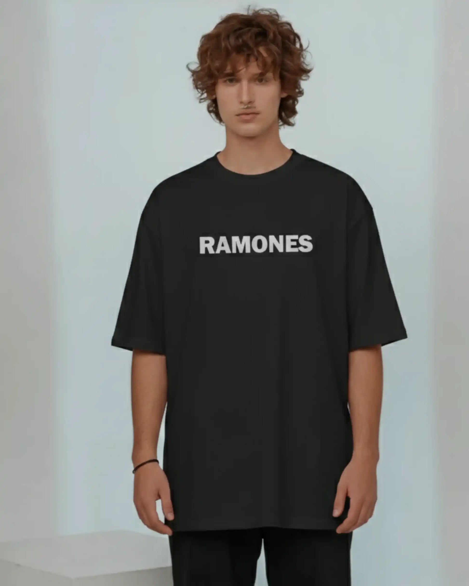 AWBlack plus size Ramones oversized t‑shirt in black 240 GSM cotton, featuring bold “RAMONES” text on front, relaxed streetwear fit, and premium heavy fabric designed for comfort and durability.