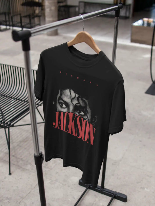 AWBlack Michael Jackson Eyes Vintage Typography Graphic T-Shirt hanging on wooden hanger | Premium 180 GSM Cotton | Multi-Fit Regular, Oversized & Plus Size S–7XL | Black Music Streetwear Tee